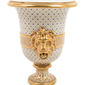 A French Parcel Gilt Porcelain