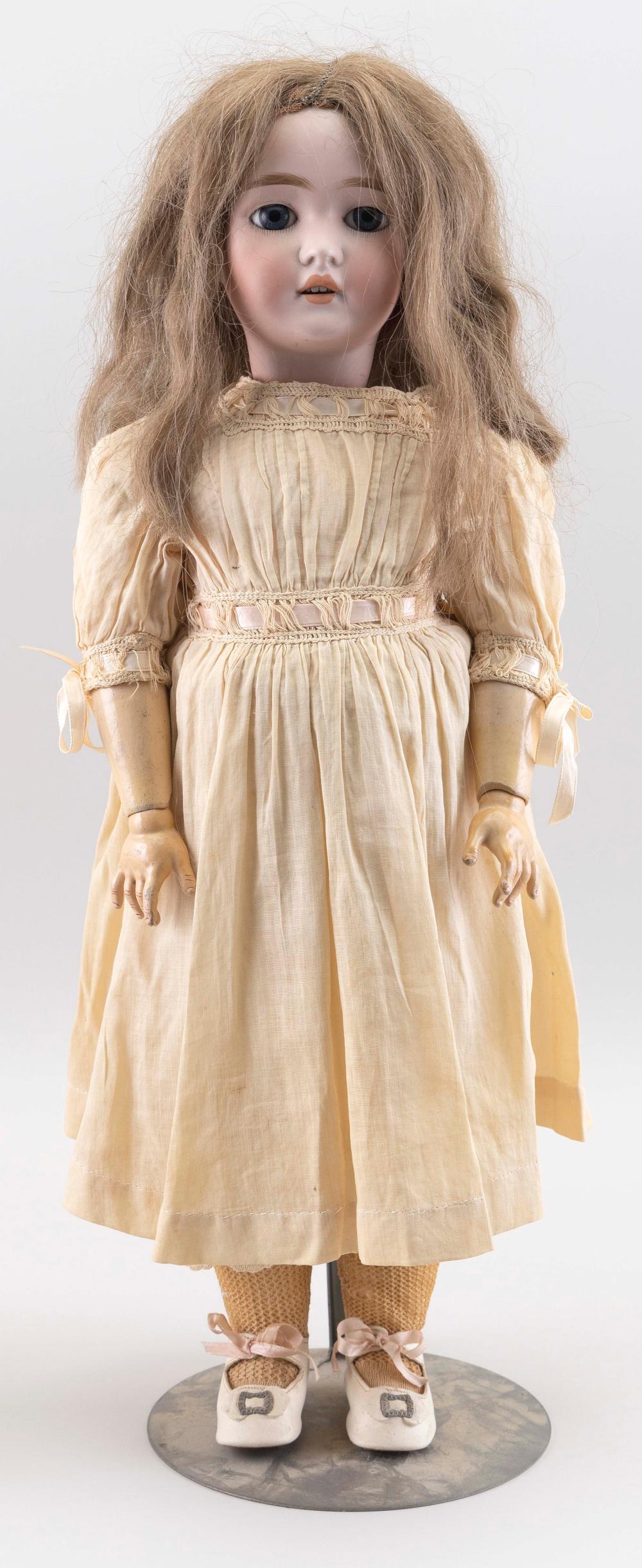 QUEEN LOUISE BISQUE-HEAD DOLL CIRCA