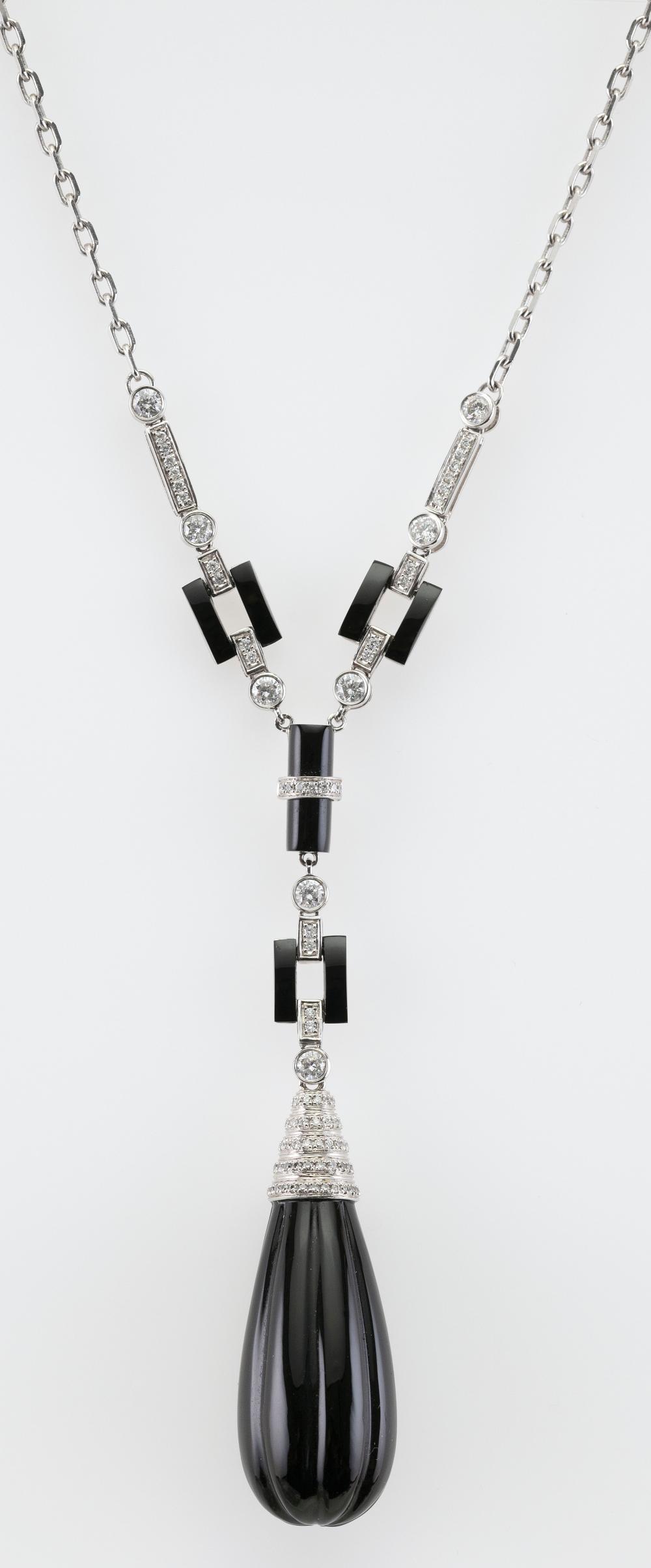 18KT WHITE GOLD, BLACK ONYX AND