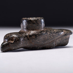 A Steatite Effigy Pipe, Hawk
Middle