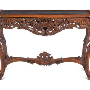 An Italian Carved Walnut Marble-Top