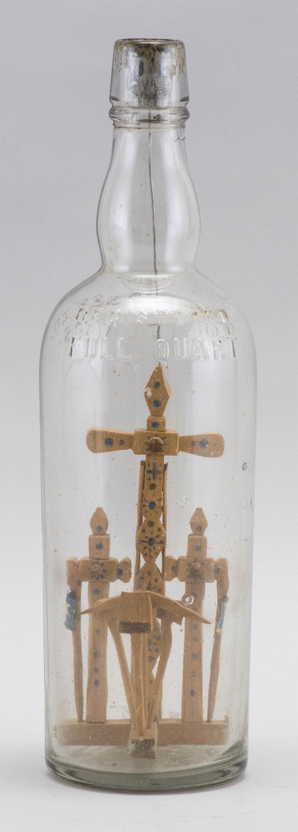 PUZZLE BOTTLE CONTAINING A CRUCIFIX 34dae9