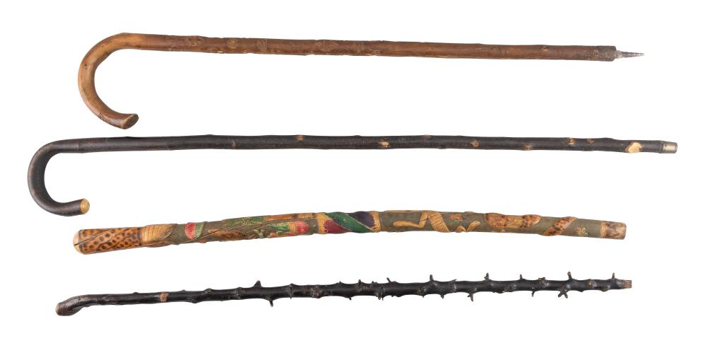 FOUR WOOD CANES AND WALKING STICKS