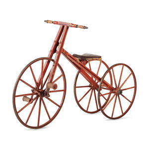 A Carved and Painted Wood Boneshaker 35079b