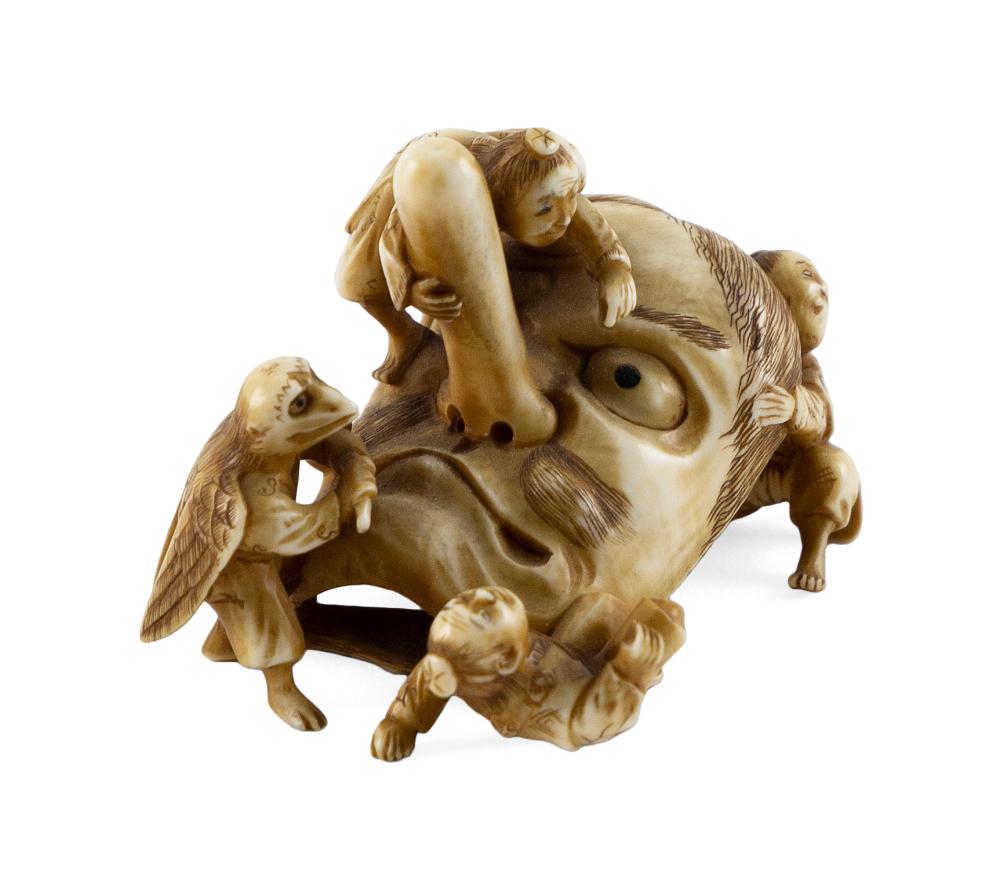 JAPANESE CARVED IVORY NETSUKE BY