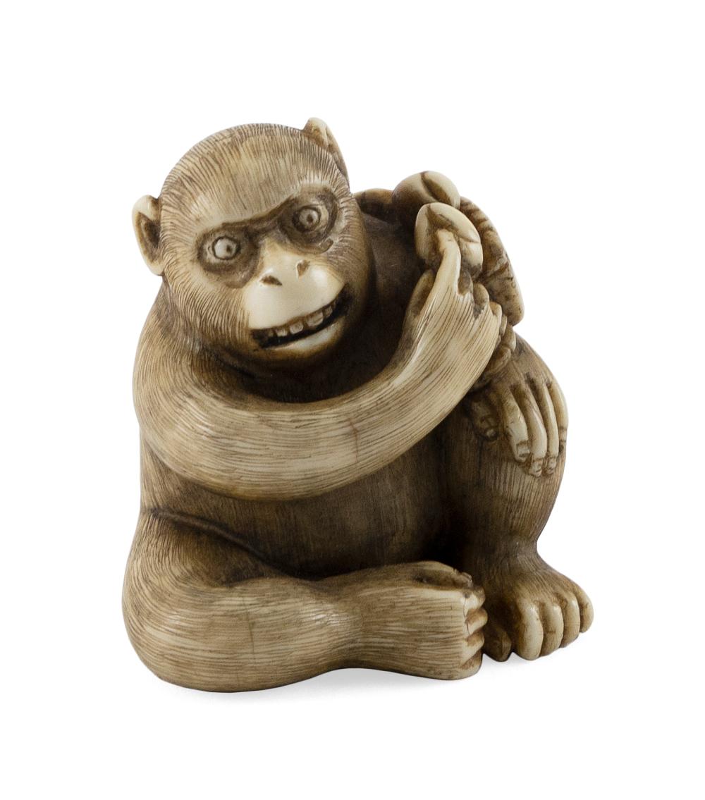 JAPANESE CARVED IVORY NETSUKE BY