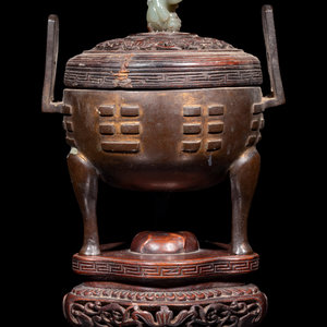 A Chinese Cast Bronze Tripod Incense