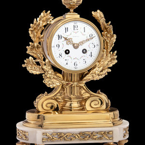 A French Gilt Bronze and Marble Clock,