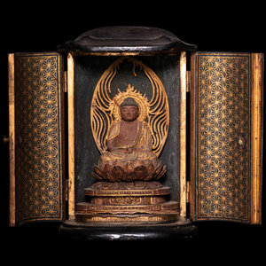 A Gilt Wood Figure of Buddha Shakyamuni