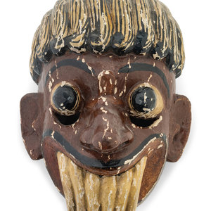 A Mexican Carved and Polychromed