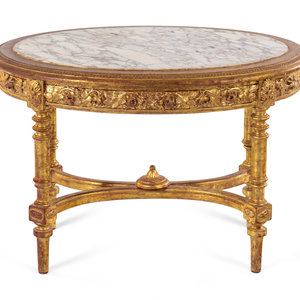 A Louis XVI Style Carved Giltwood