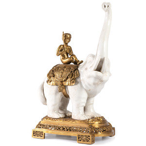 A Brass and Earthenware Elephant Figure
with