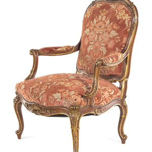 A Louis XV Style Carved and Parcel