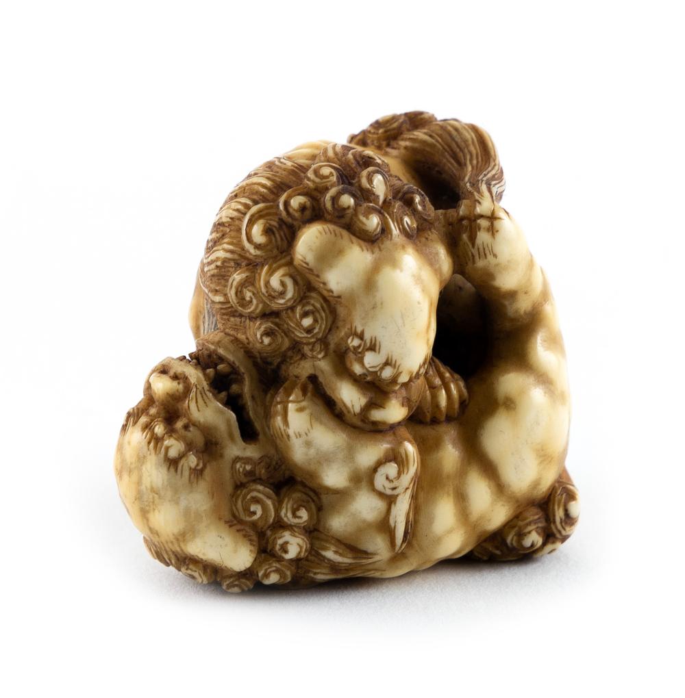 JAPANESE CARVED IVORY NETSUKE BY