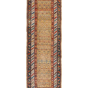 A Yellow-Ground Shirvan Wool Rug
Circa