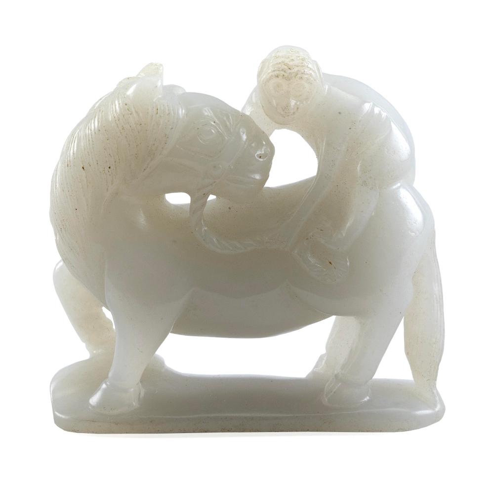 CHINESE CARVED WHITE JADE FIGURE