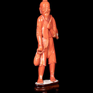 A Chinese Red Coral Figure of a