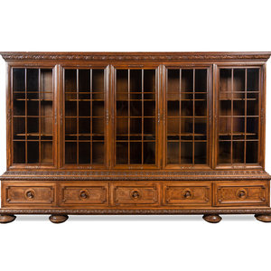 A Renaissance Revival Carved Walnut