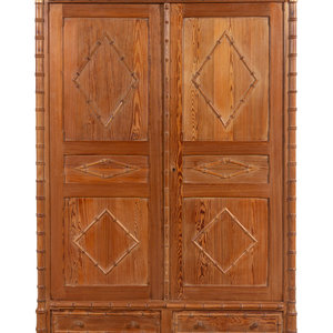 A Faux Bamboo Carved Pine Armoire
Late