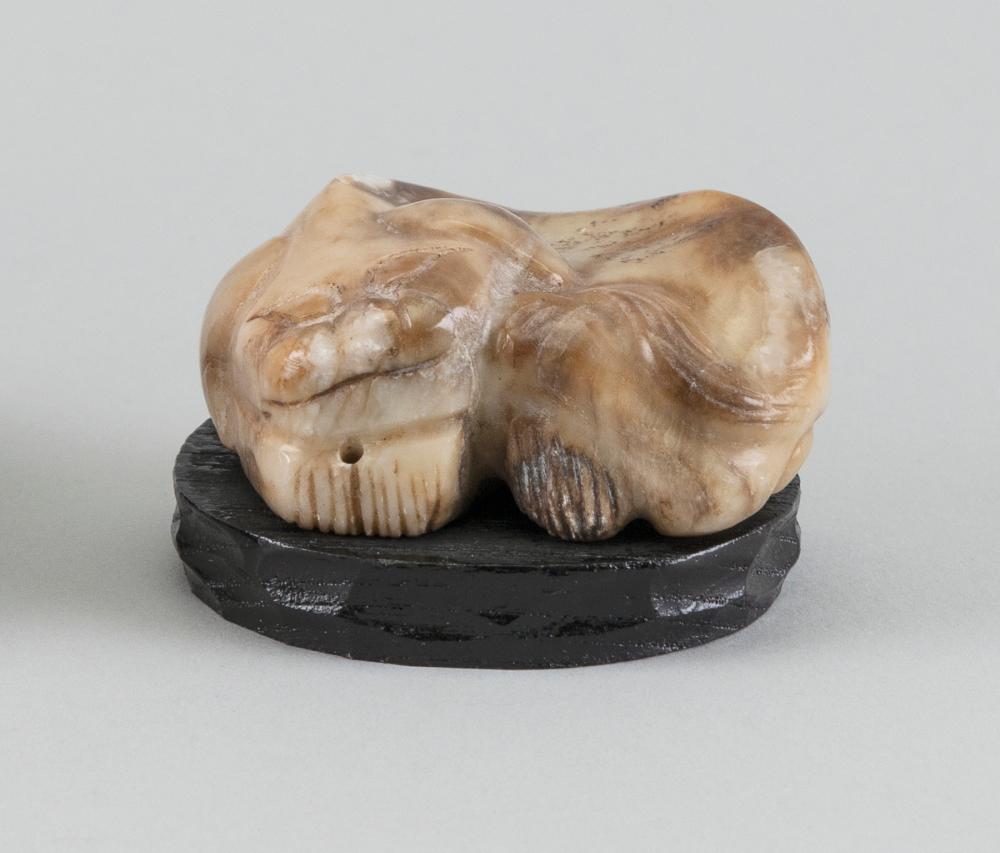 CHINESE CARVED MUTTONFAT JADE RECUMBENT