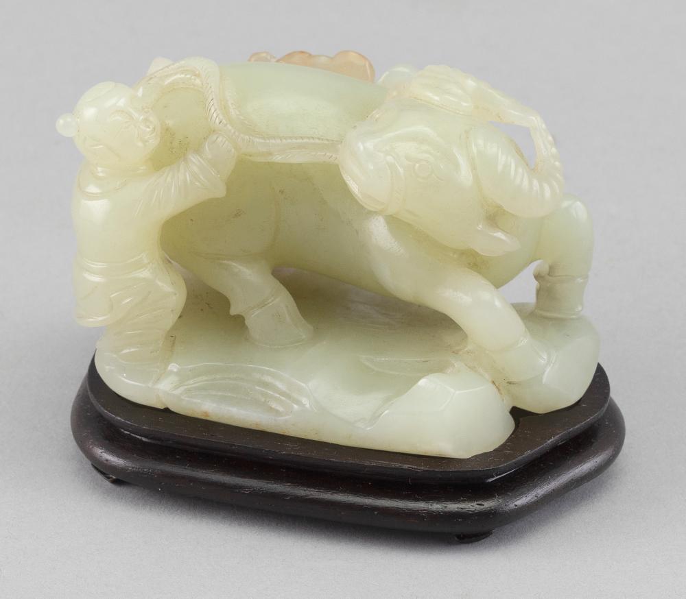 CHINESE CARVED CELADON JADE FIGURE