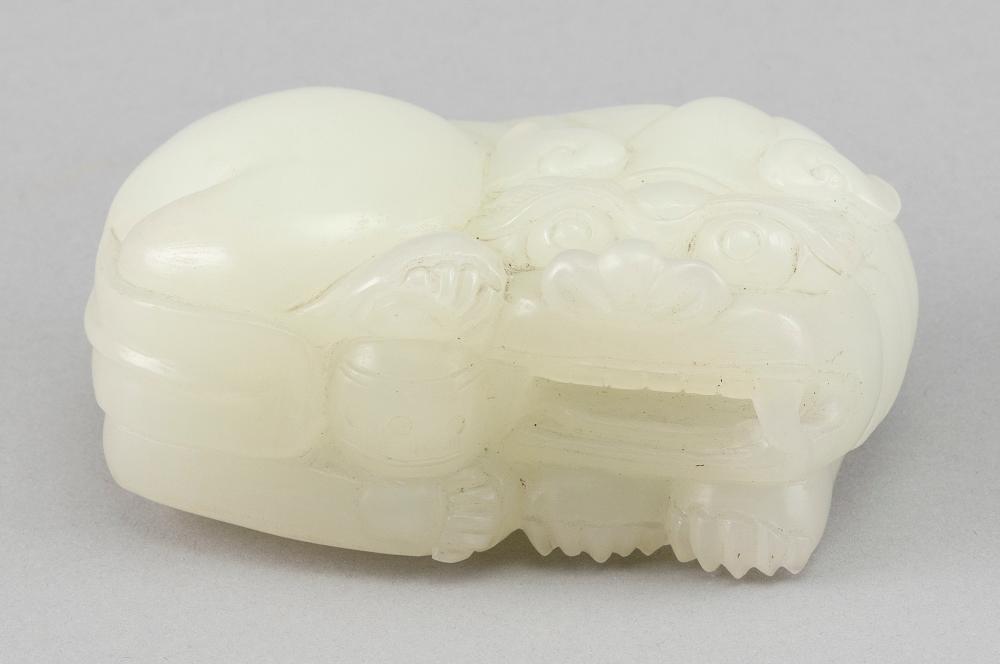 CHINESE CARVED WHITE JADE FIGURE