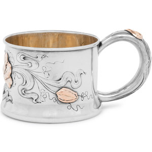 An American Silver and Mixed Metal Mug
George