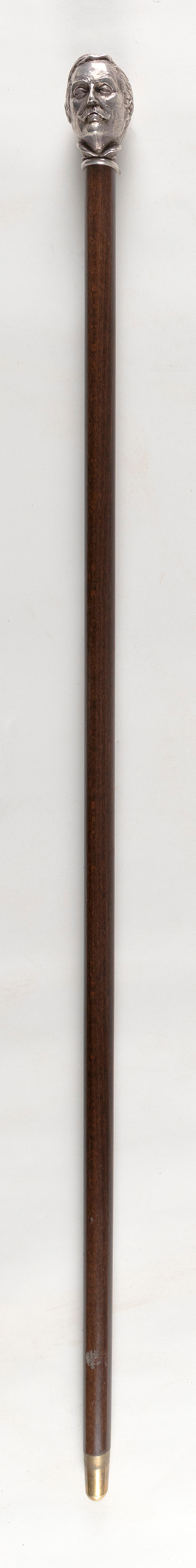 CANE WITH SILVER PLATED HANDLE