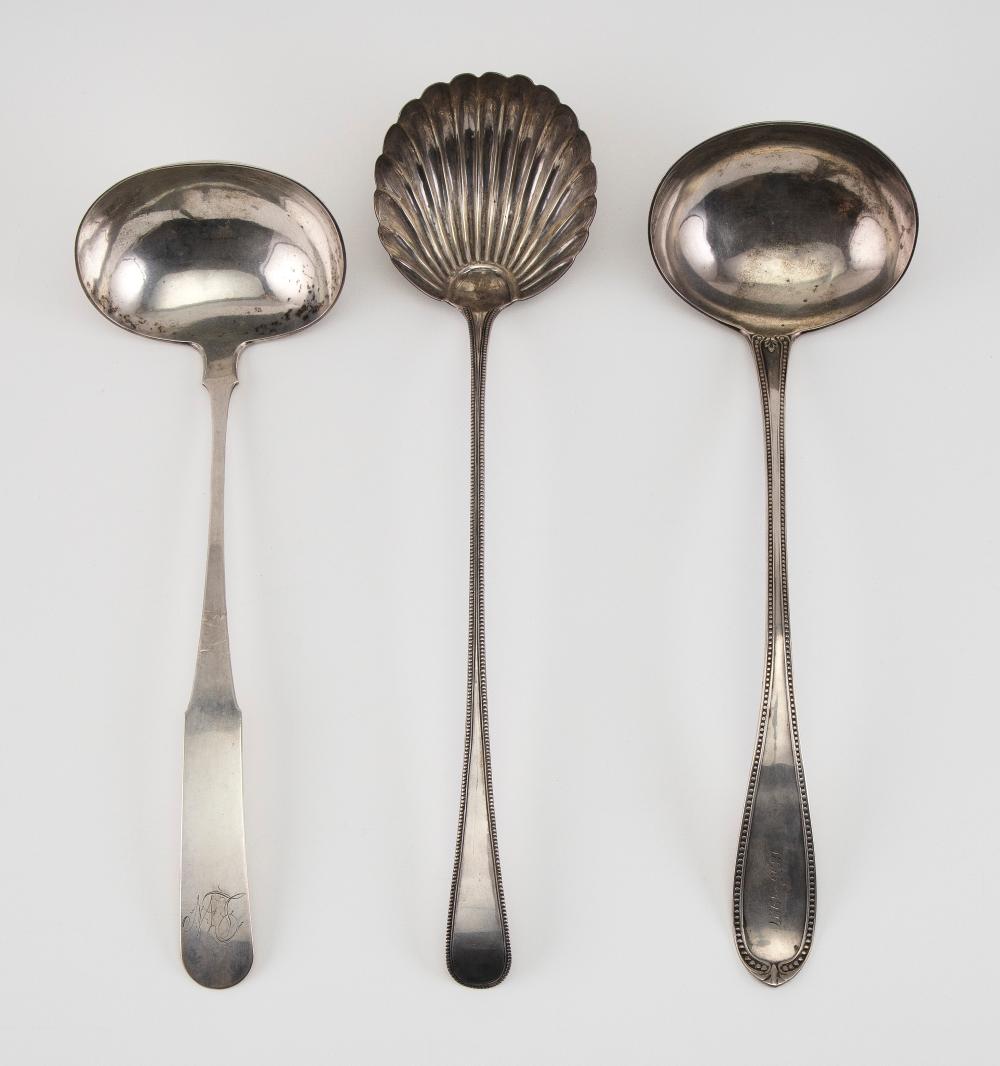 THREE SILVER SOUP LADLES APPROX.