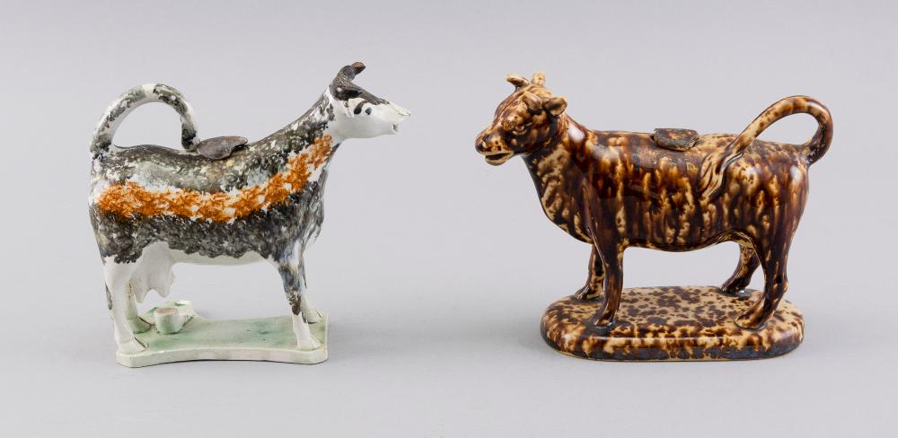 TWO STAFFORDSHIRE POTTERY COW CREAMERS