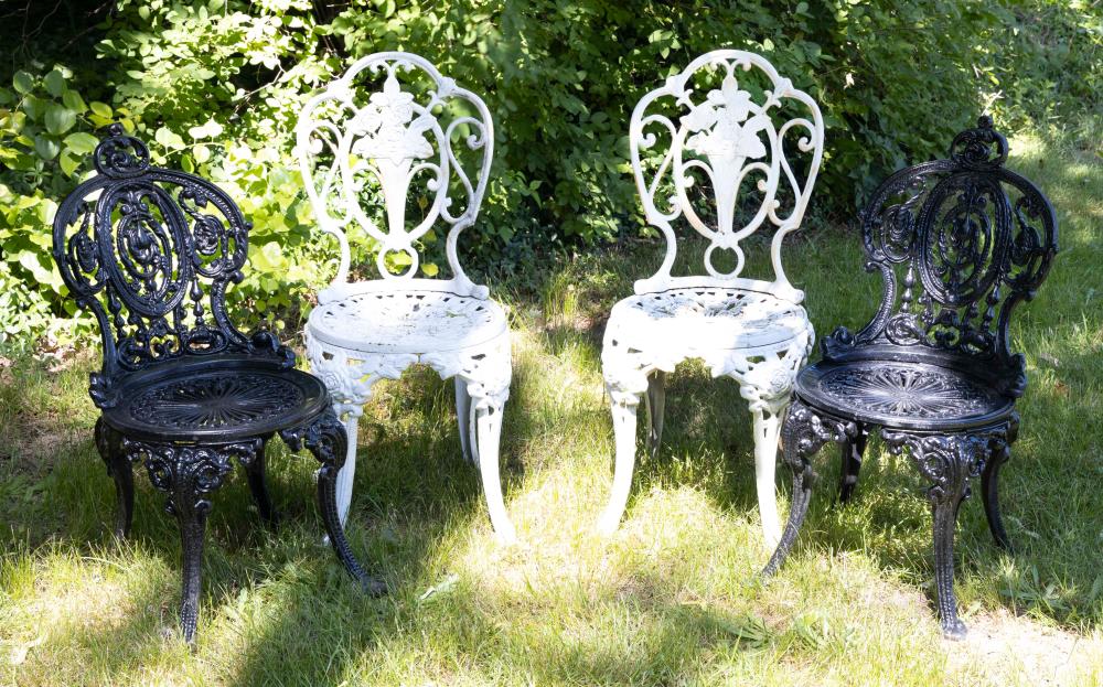 FOUR PAINTED CAST IRON GARDEN CHAIRS 34fcde