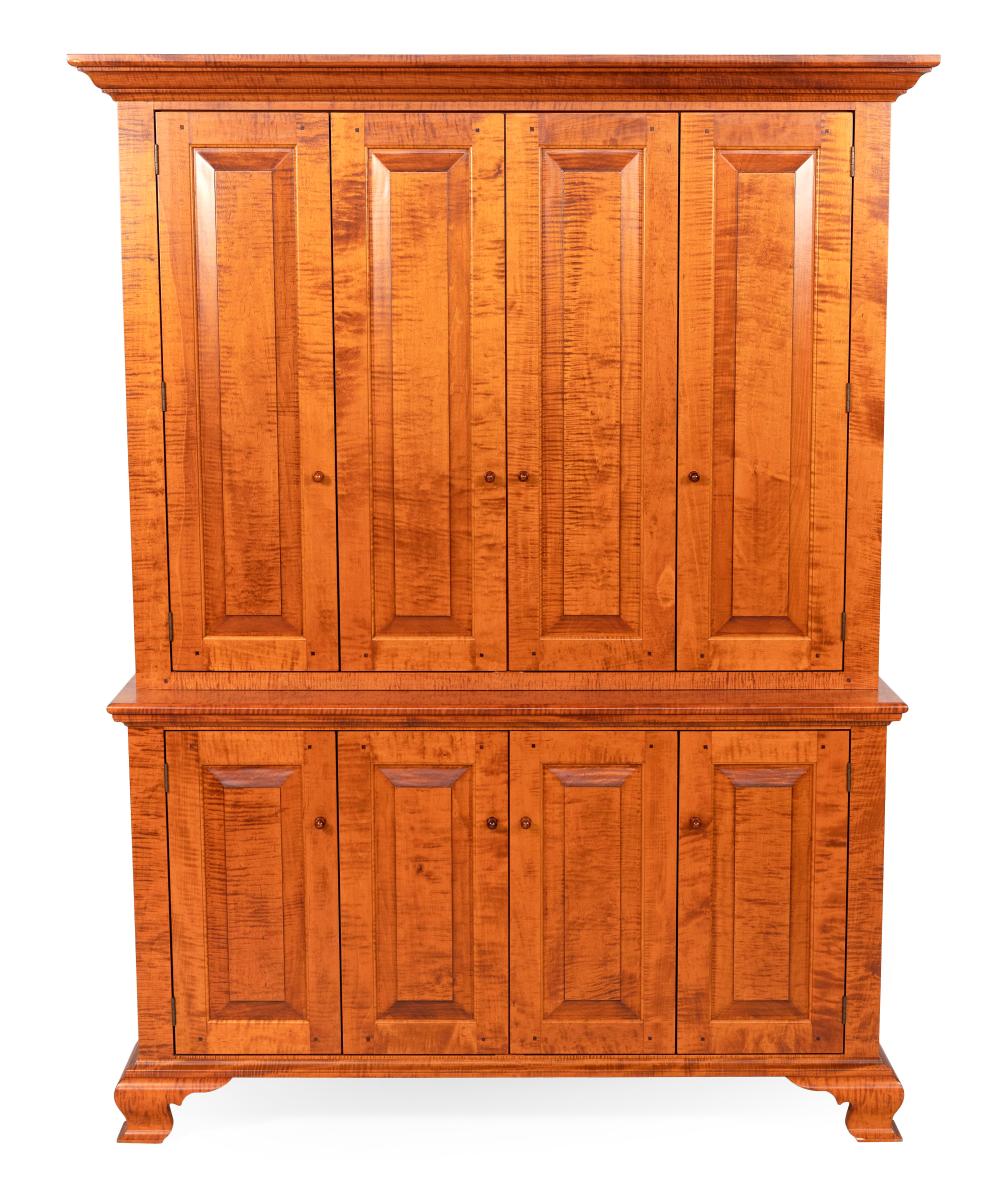 TWO-PART CUPBOARD ATTRIBUTED TO