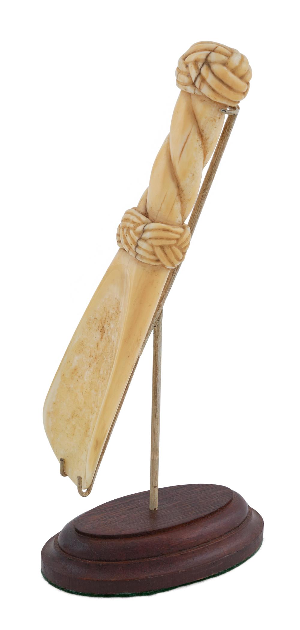 WALRUS IVORY SCOOP WITH ROPE CARVINGS