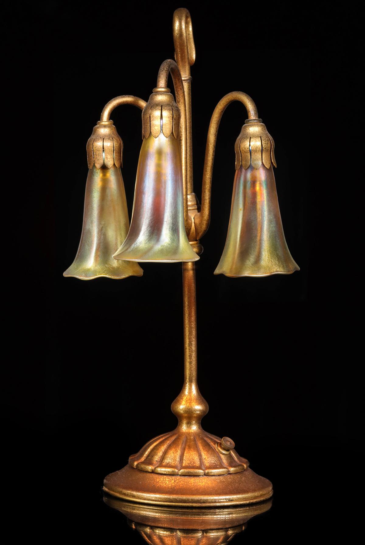 A GOOD TIFFANY STUDIOS BRONZE THREE