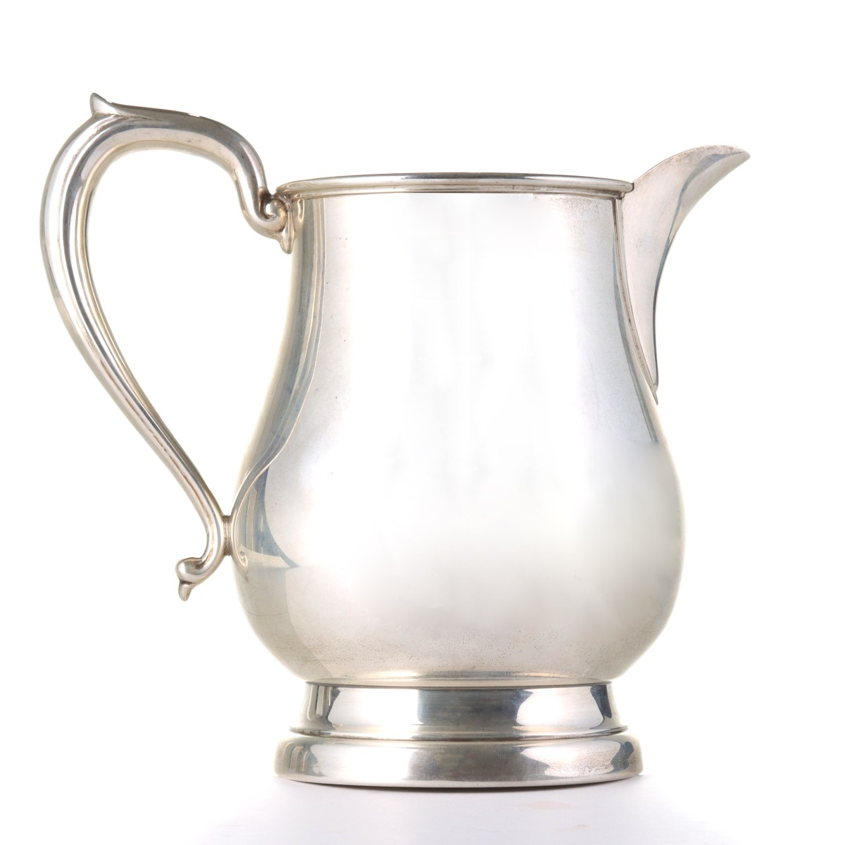 A STERLING SILVER WATER PITCHER