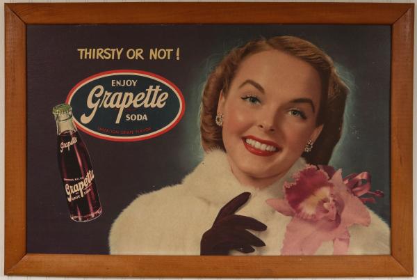 A 1940S GRAPETTE SODA CARDBOARD