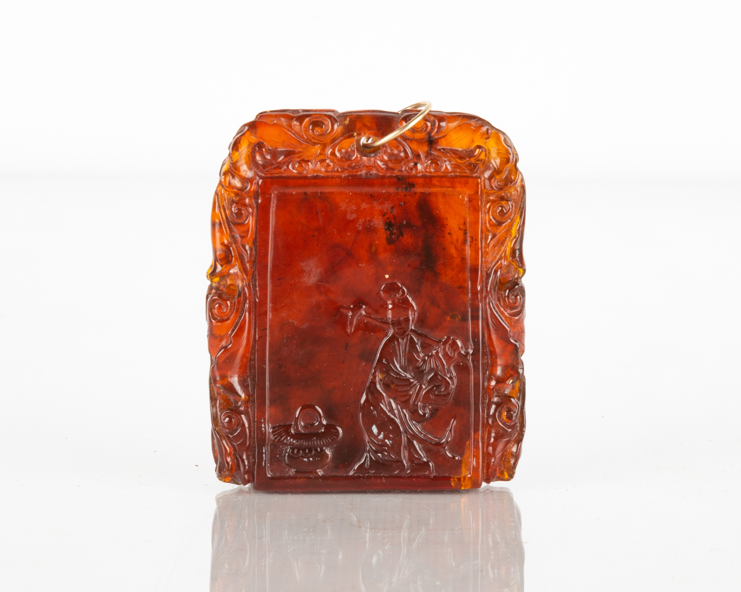 CHINESE CARVED AMBER PENDANT with 352fb0
