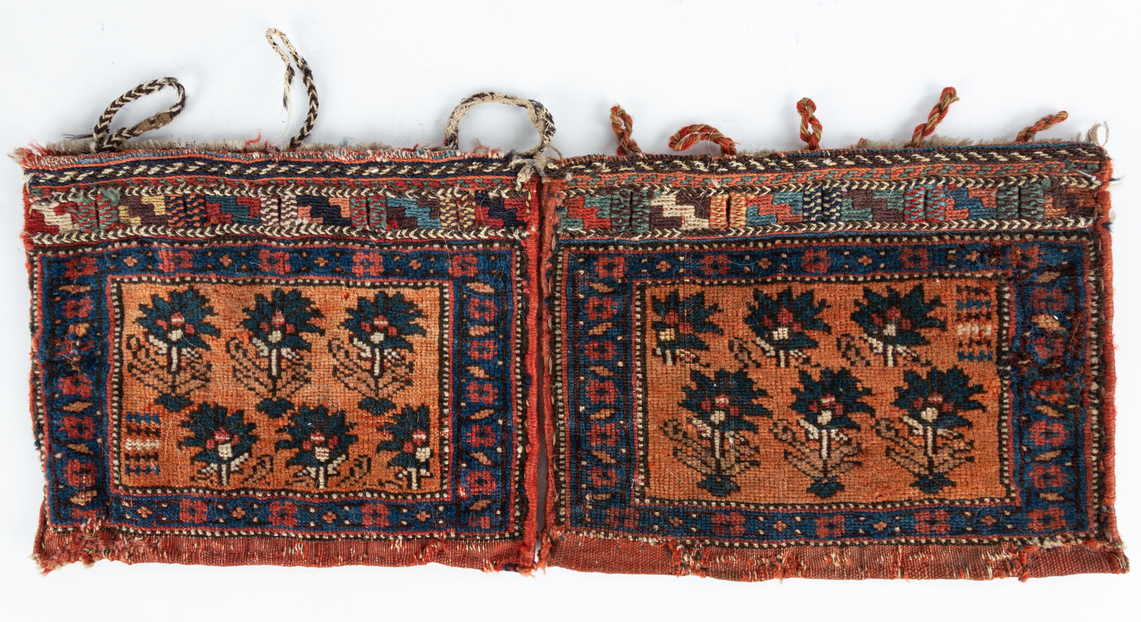 DIMINUTIVE PERSIAN BAG FACES circa