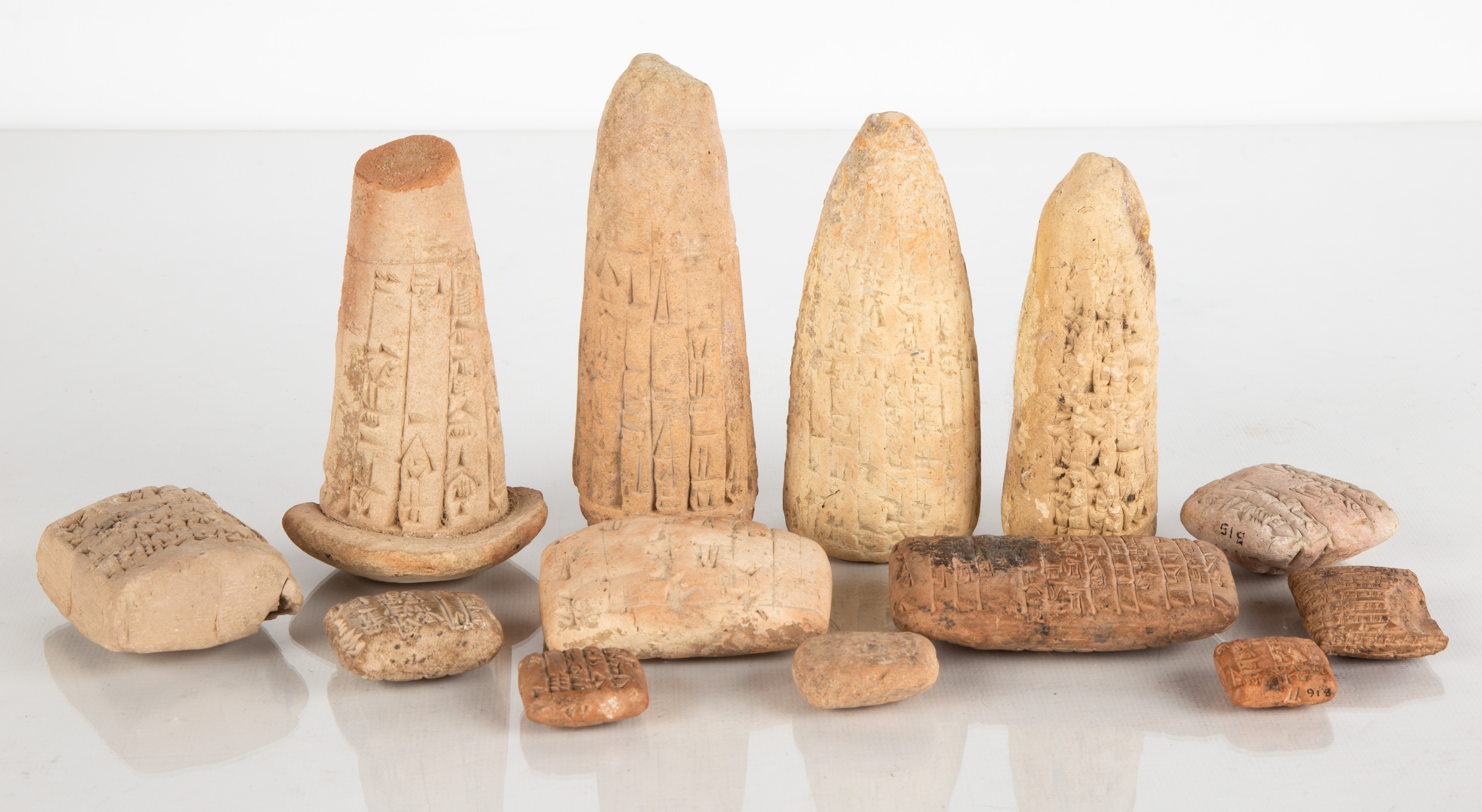 CUNEIFORM TABLETS & VOTIVE CONES