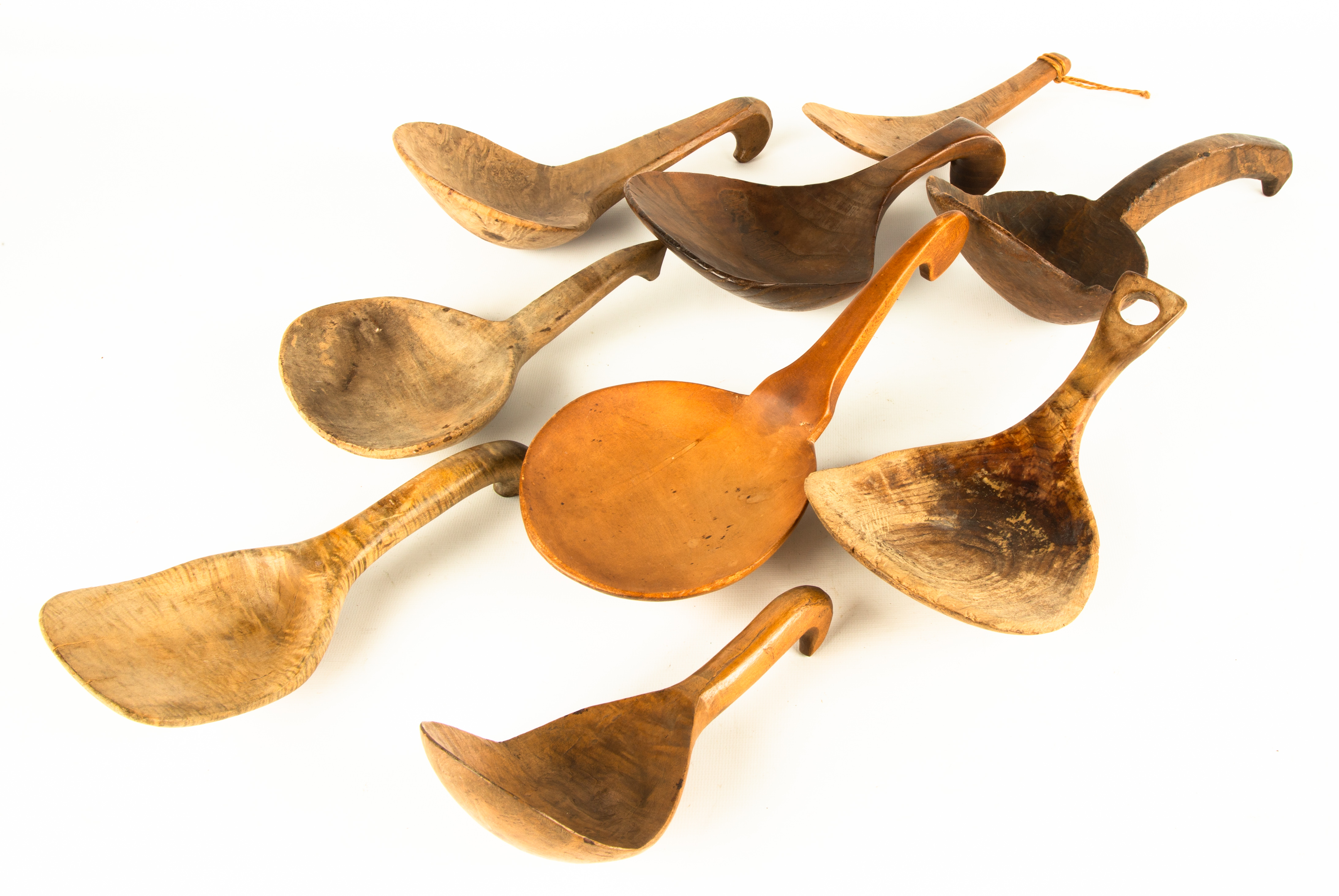 (9) FIGURED MAPLE LADLES Early