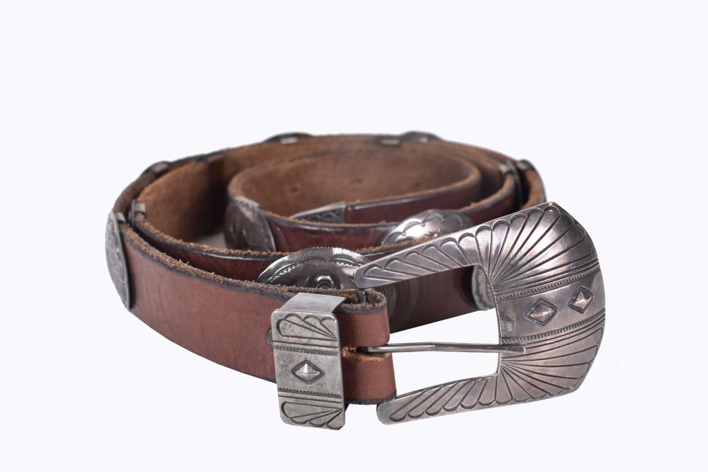 NAVAJO SILVER-MOUNTED LEATHER CONCHO
