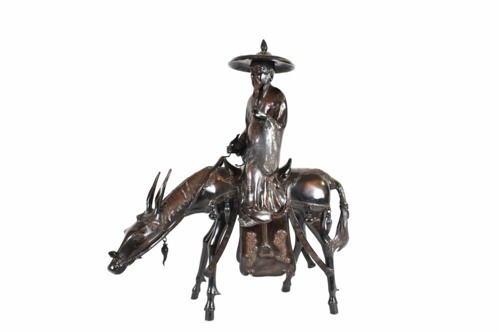 CHINESE PATINATED BRONZE OF A TRAVELER 353611