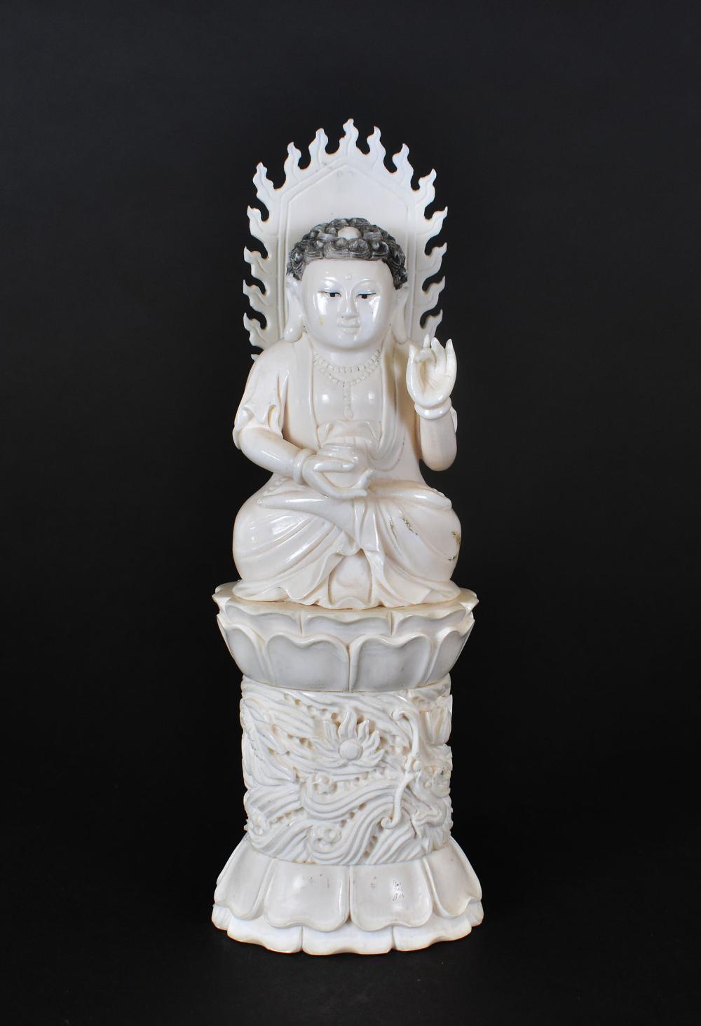 JAPANESE OKIMONO OF A SEATED BUDDHAIn