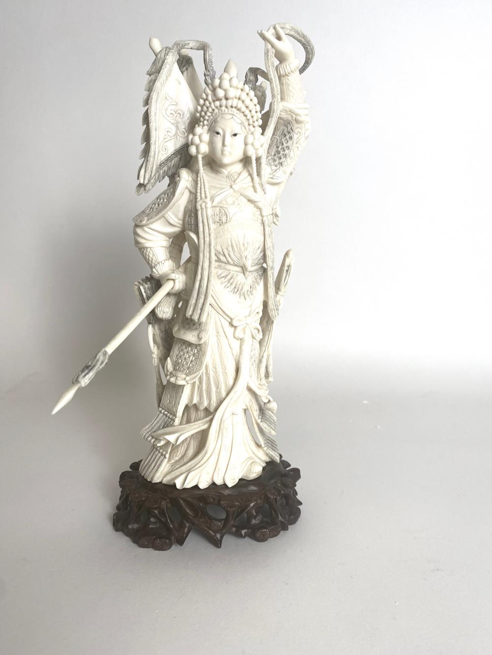 CHINESE CARVING OF A FEMALE WARRIOR