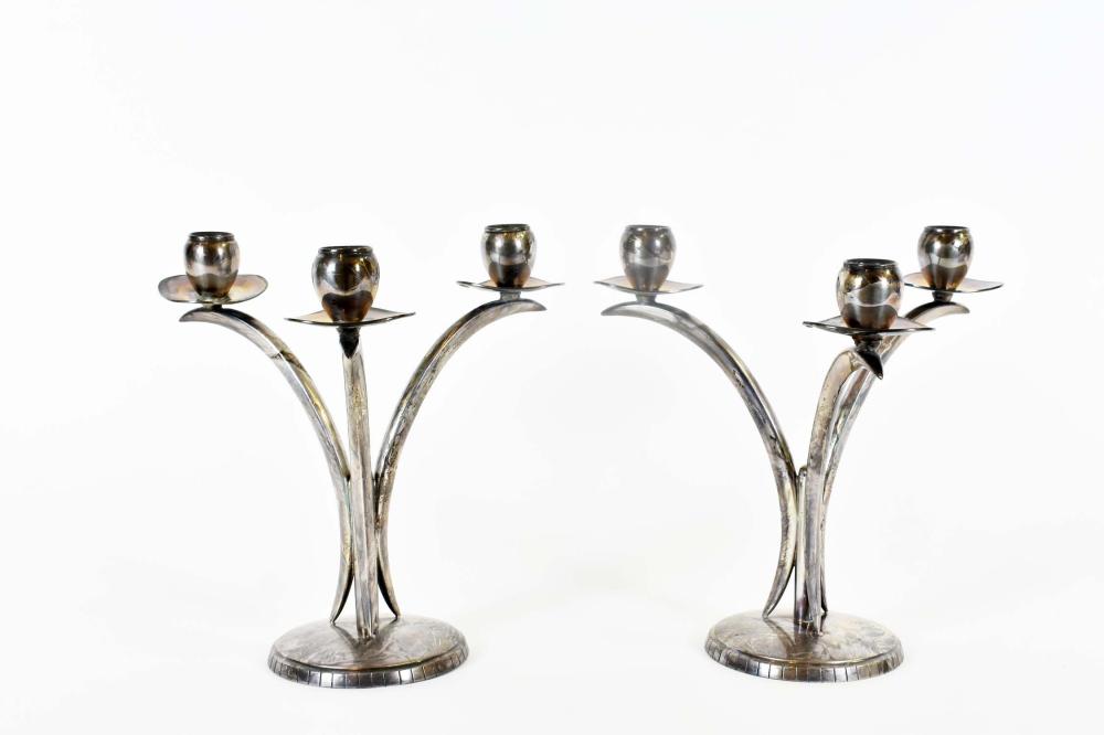 PAIR OF SILVER PLATE THREE-LIGHT CANDELABRAProbably