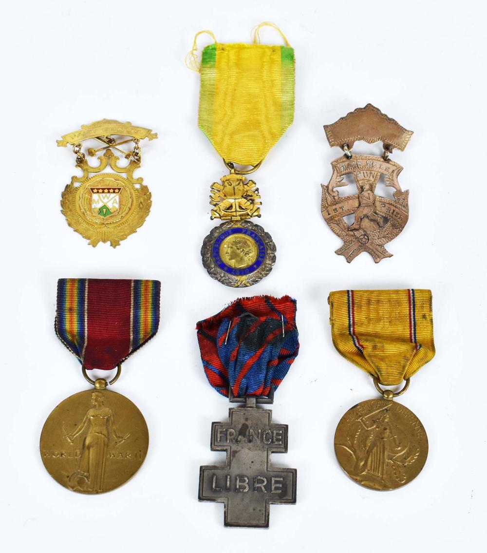 SEVEN WORLD WAR II RELATED MEDALS AND