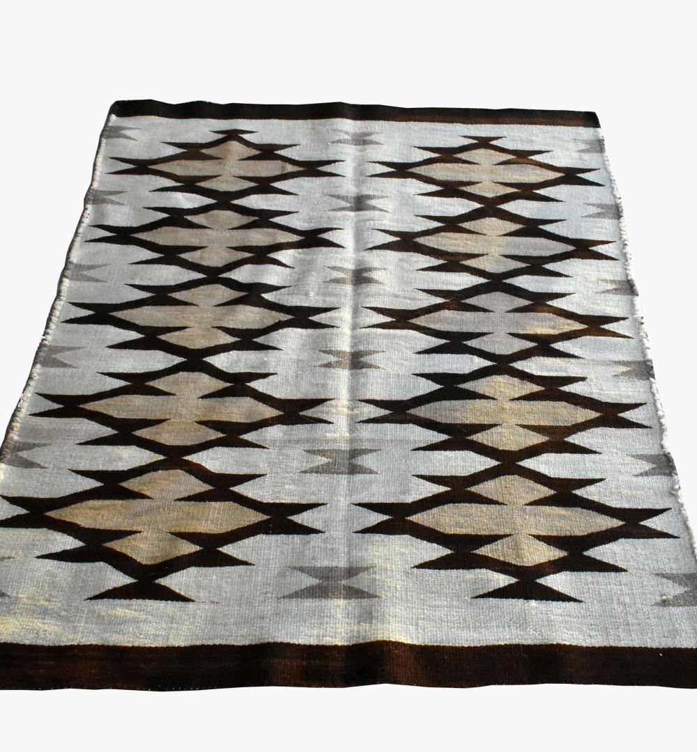 NAVAJO WOOL BLANKETDecorated with stylized