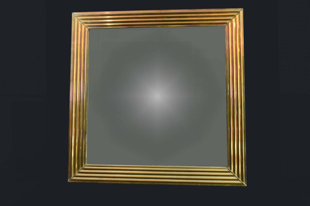 BRASS MOUNTED MIRRORThe mirror