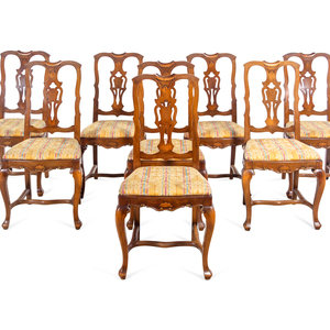 A Set of Eight French Walnut Dining