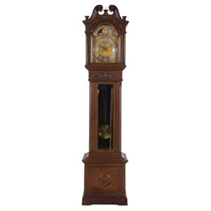 A Carved Oak Tall Case Clock
First